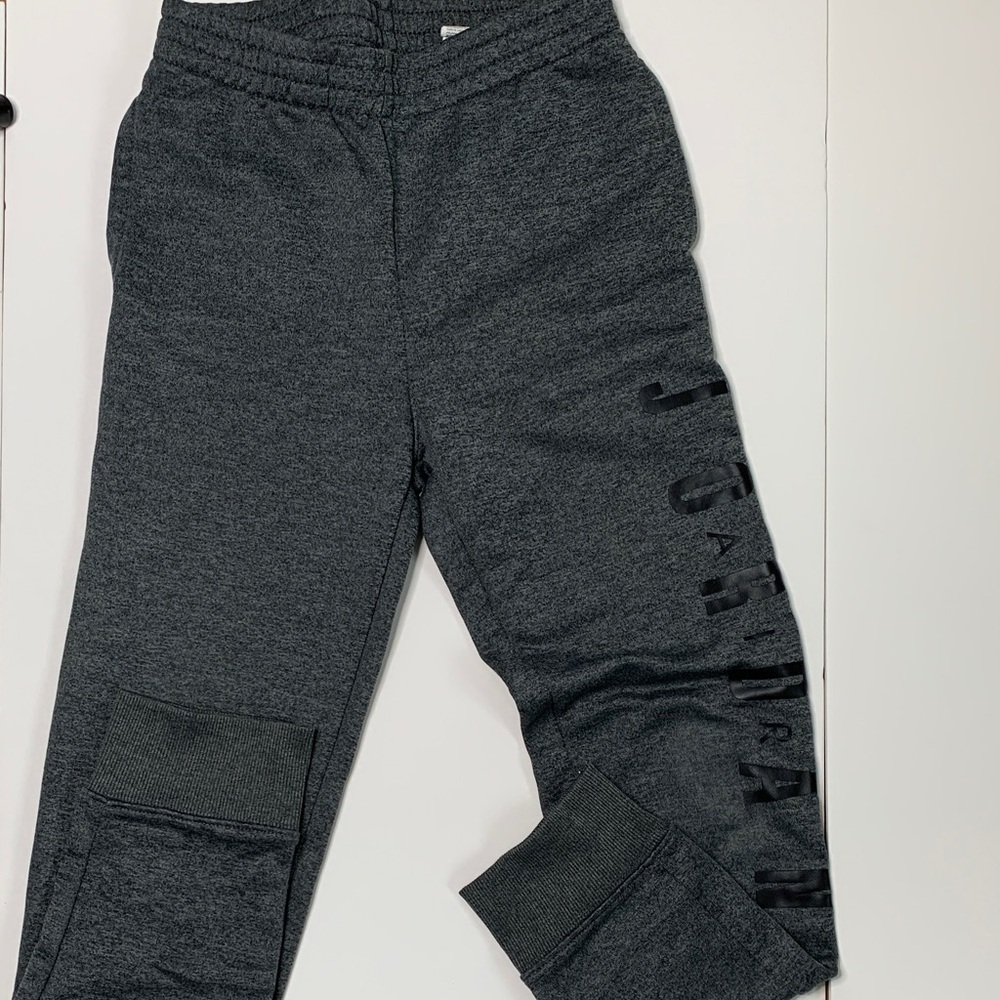 Jordan gray fleece sweatpants or joggers with a black vertical logo on the leg M